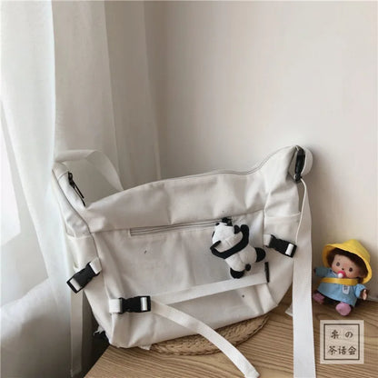 Canvas Crossbody Bag with Plush Pendant – Large Capacity Women's Shoulder Bag