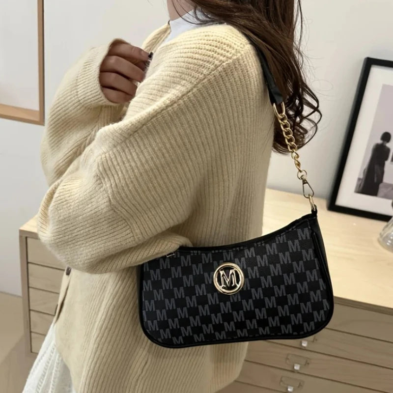 Classic Pattern Shoulder Bags Round Gold Emblem Adjustable Strap Elegant Design Daily Commutes