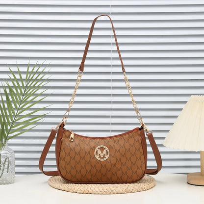 Classic Pattern Shoulder Bags Round Gold Emblem Adjustable Strap Elegant Design Daily Commutes