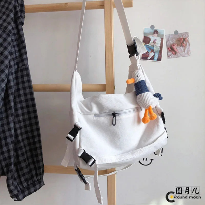 Canvas Crossbody Bag with Plush Pendant – Large Capacity Women's Shoulder Bag