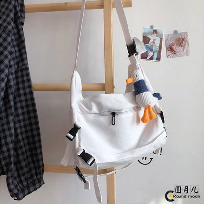 Canvas Crossbody Bag with Plush Pendant – Large Capacity Women's Shoulder Bag