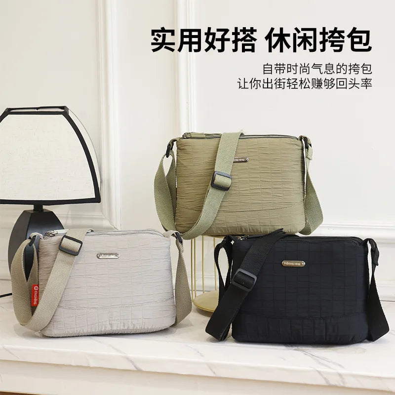 Large capacity ladies casual light travel nylon pleated wear-resistant shoulder crossbody bag