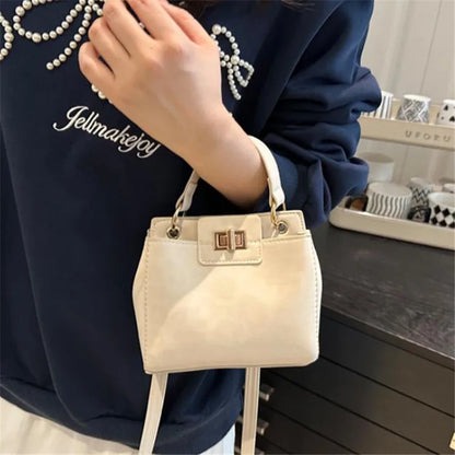 Mini Top Handle Crossbody Bag with Gold Lock Hardware