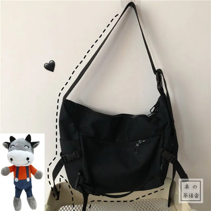 Canvas Crossbody Bag with Plush Pendant – Large Capacity Women's Shoulder Bag