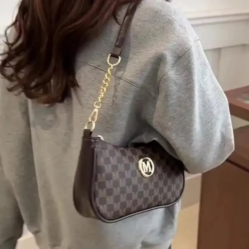 Classic Pattern Shoulder Bags Round Gold Emblem Adjustable Strap Elegant Design Daily Commutes