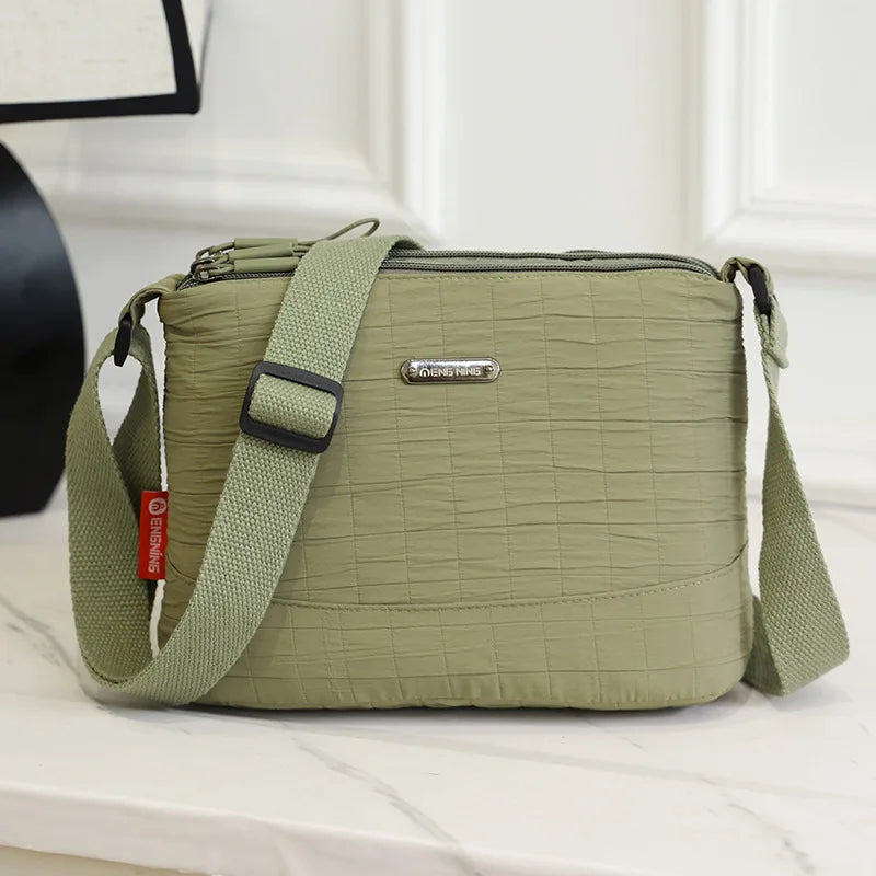 Large capacity ladies casual light travel nylon pleated wear-resistant shoulder crossbody bag