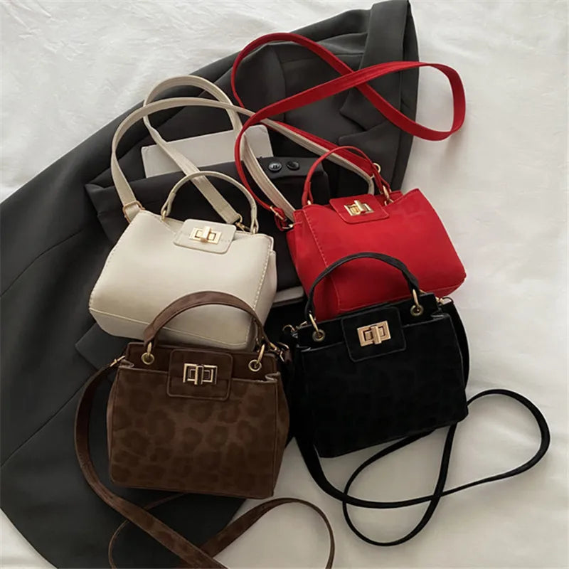 Mini Top Handle Crossbody Bag with Gold Lock Hardware