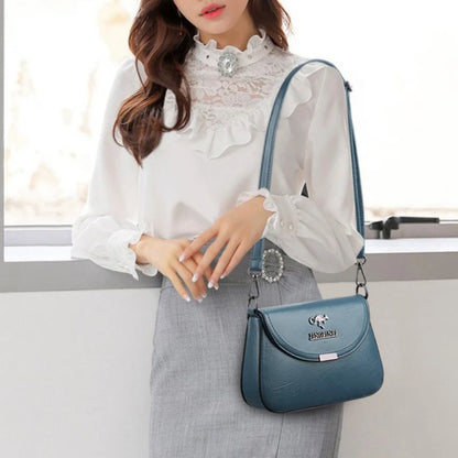 Mini Faux Leather Crossbody Bag with Metal Logo Detail