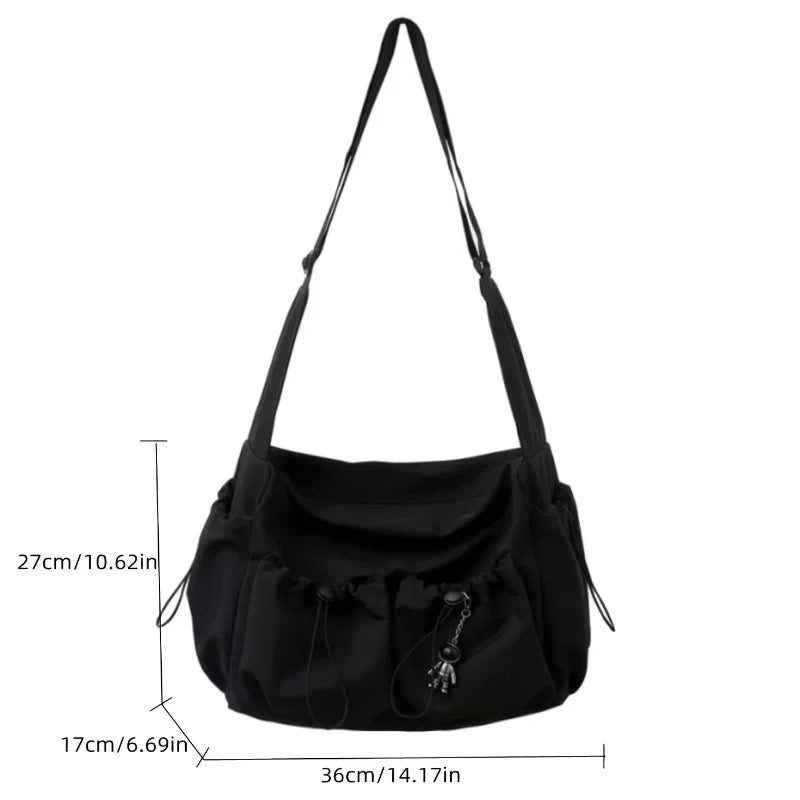 Large Crossbody Bag with Drawstring Accent & Charm – Spacious Zipper Shoulder Bag
