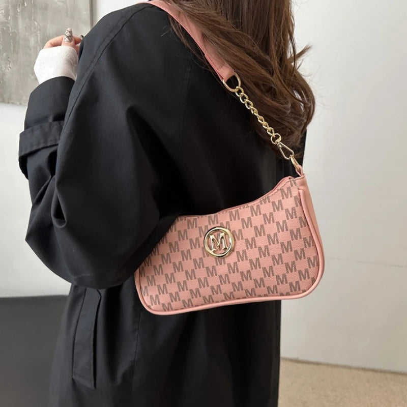 Classic Pattern Shoulder Bags Round Gold Emblem Adjustable Strap Elegant Design Daily Commutes