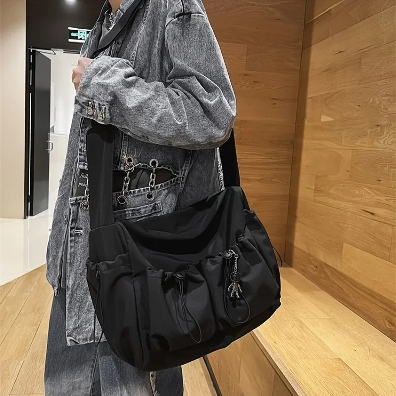 Large Crossbody Bag with Drawstring Accent & Charm – Spacious Zipper Shoulder Bag