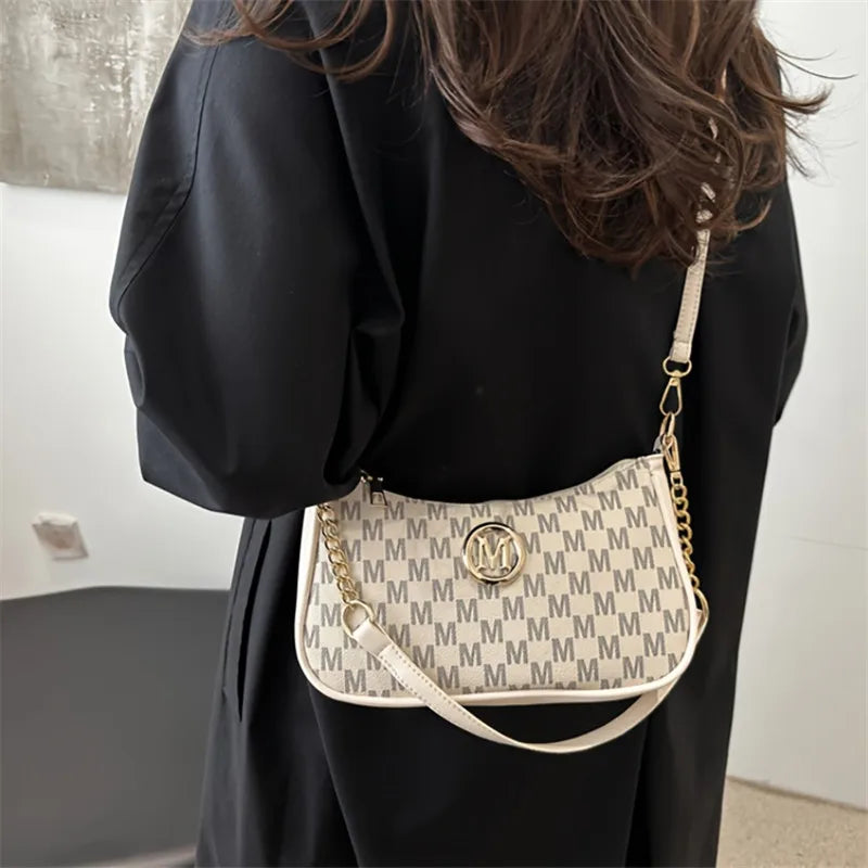 Classic Pattern Shoulder Bags Round Gold Emblem Adjustable Strap Elegant Design Daily Commutes