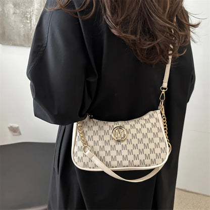 Classic Pattern Shoulder Bags Round Gold Emblem Adjustable Strap Elegant Design Daily Commutes