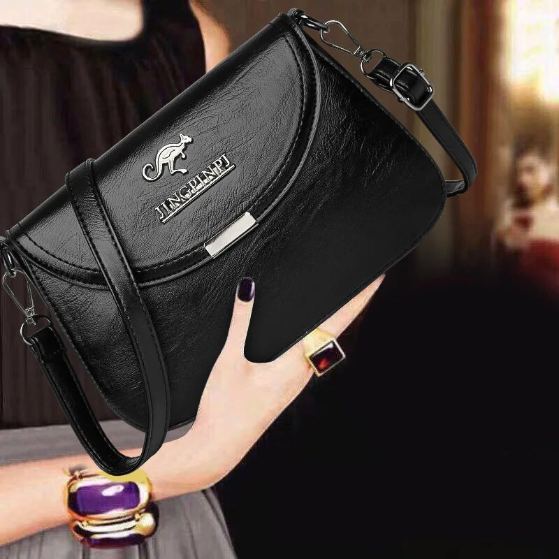 Mini Faux Leather Crossbody Bag with Metal Logo Detail