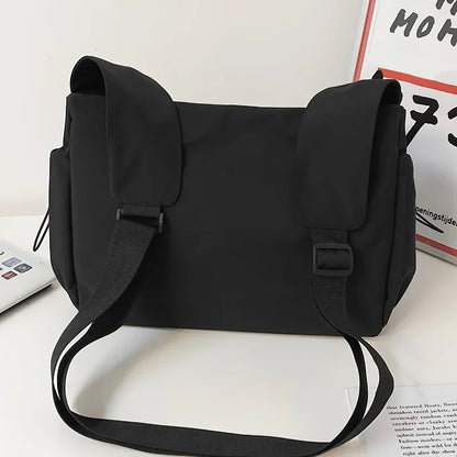Large Crossbody Bag with Drawstring Accent & Charm – Spacious Zipper Shoulder Bag