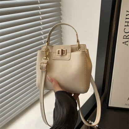 Mini Top Handle Crossbody Bag with Gold Lock Hardware