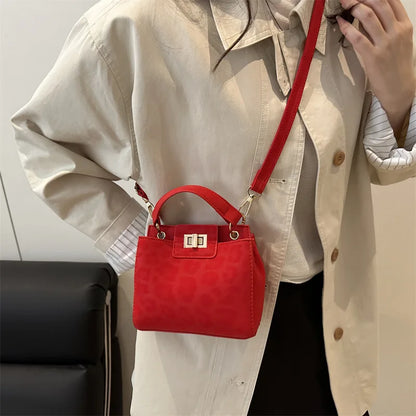 Mini Top Handle Crossbody Bag with Gold Lock Hardware