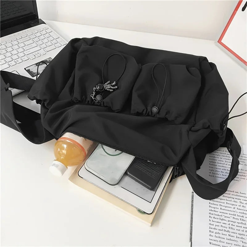 Large Crossbody Bag with Drawstring Accent & Charm – Spacious Zipper Shoulder Bag