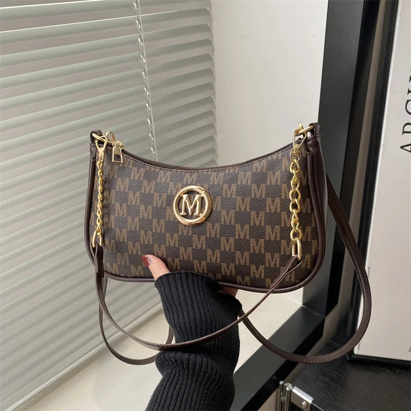 Classic Pattern Shoulder Bags Round Gold Emblem Adjustable Strap Elegant Design Daily Commutes
