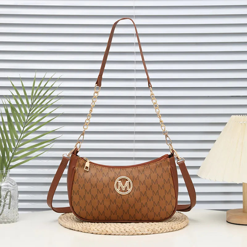 Classic Pattern Shoulder Bags Round Gold Emblem Adjustable Strap Elegant Design Daily Commutes