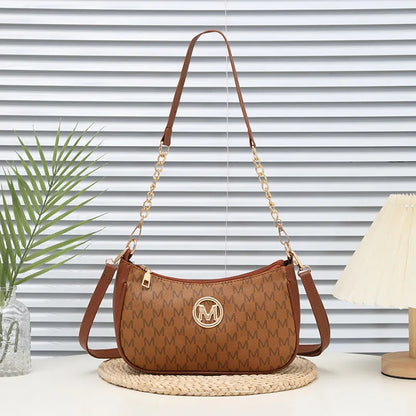 Classic Pattern Shoulder Bags Round Gold Emblem Adjustable Strap Elegant Design Daily Commutes