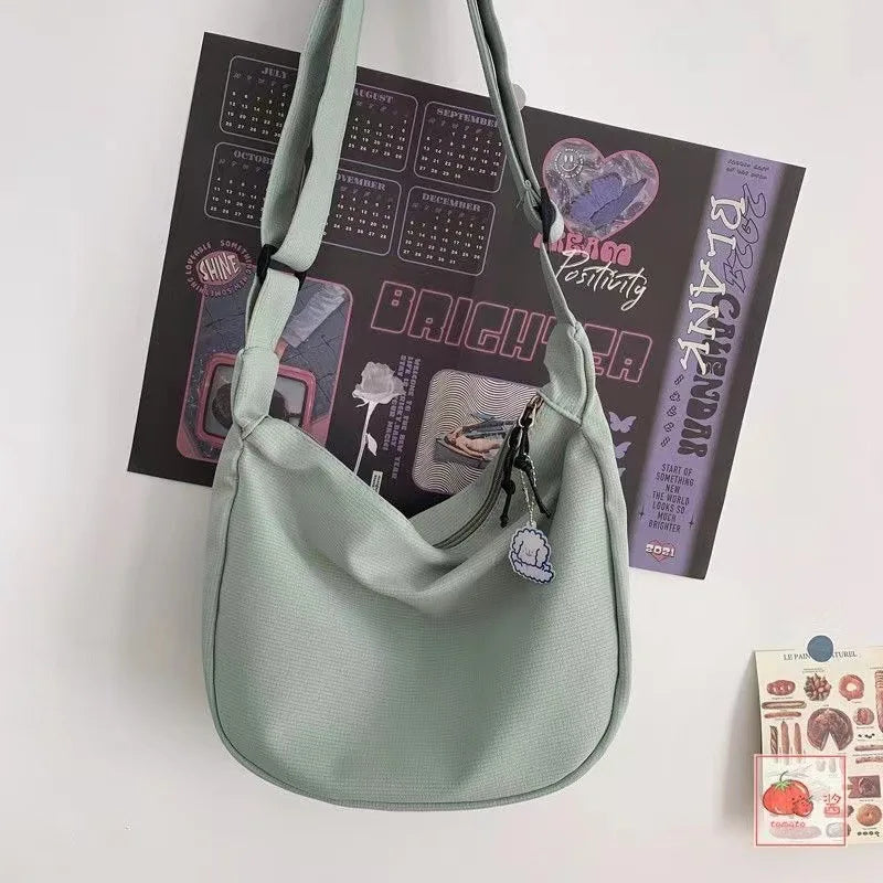 Canvas Crossbody Bag with Charm – Large Capacity Shoulder Bag