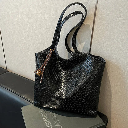 Woven Leather Tote Bag for Women – Soft Shoulder Handbag with Braided Pendant