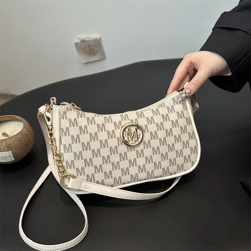 Classic Pattern Shoulder Bags Round Gold Emblem Adjustable Strap Elegant Design Daily Commutes