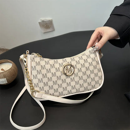 Classic Pattern Shoulder Bags Round Gold Emblem Adjustable Strap Elegant Design Daily Commutes
