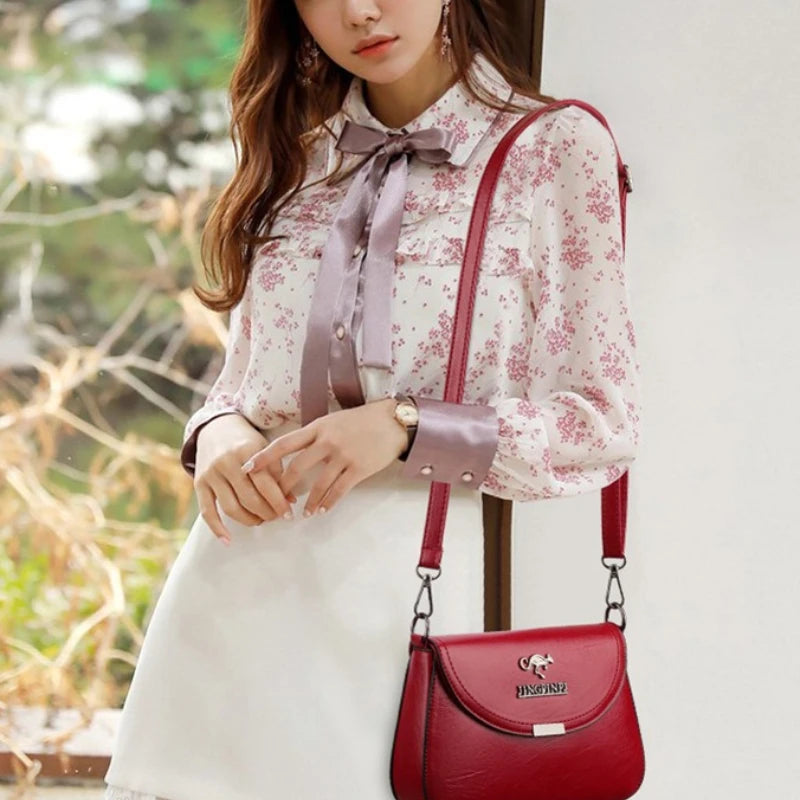 Mini Faux Leather Crossbody Bag with Metal Logo Detail