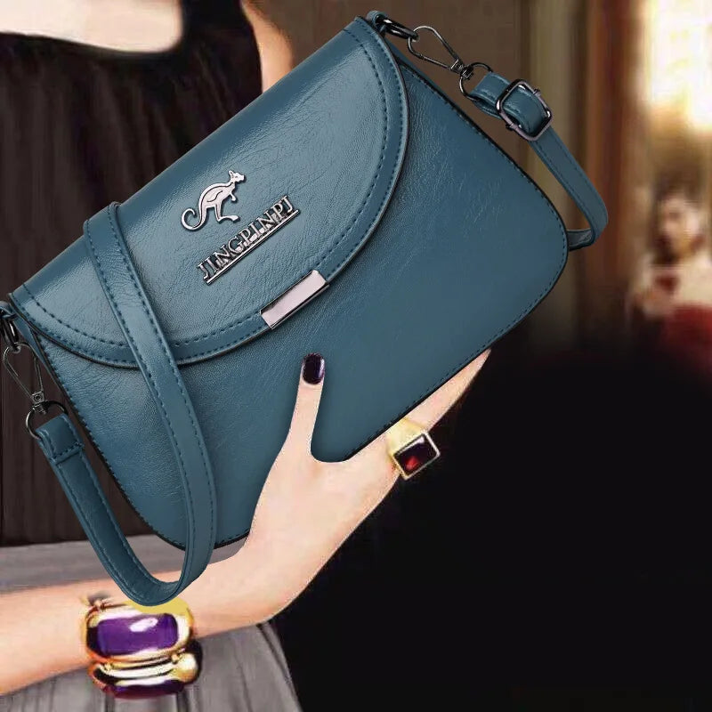Mini Faux Leather Crossbody Bag with Metal Logo Detail