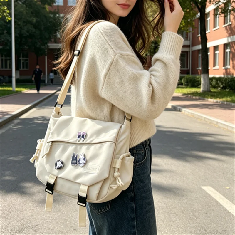 Multi-Pocket Nylon Crossbody Bag – Casual Messenger Bag with Badge for Teen, School & Travel