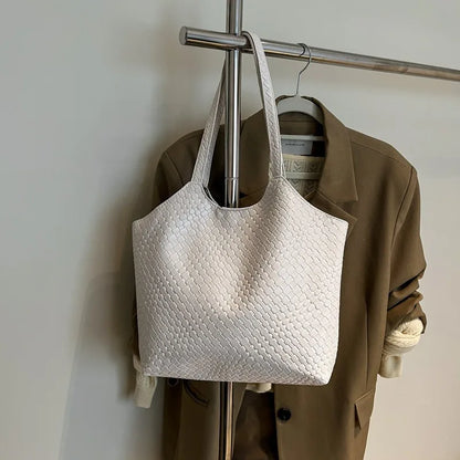 Woven Leather Tote Bag for Women – Soft Shoulder Handbag with Braided Pendant