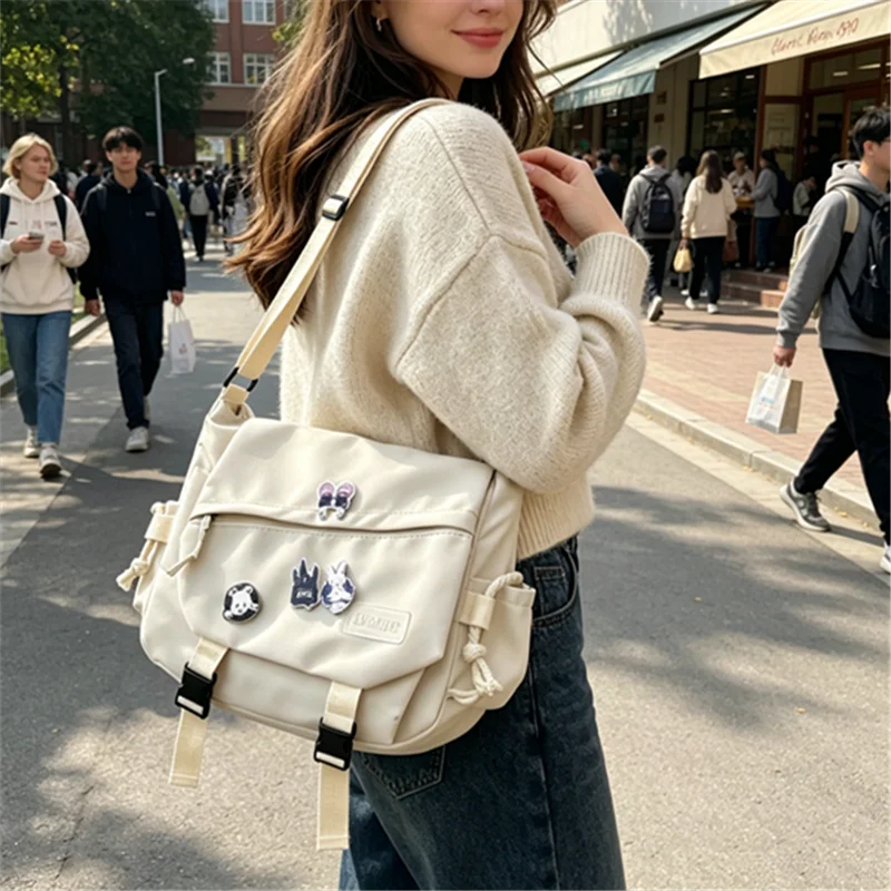 Multi-Pocket Nylon Crossbody Bag – Casual Messenger Bag with Badge for Teen, School & Travel