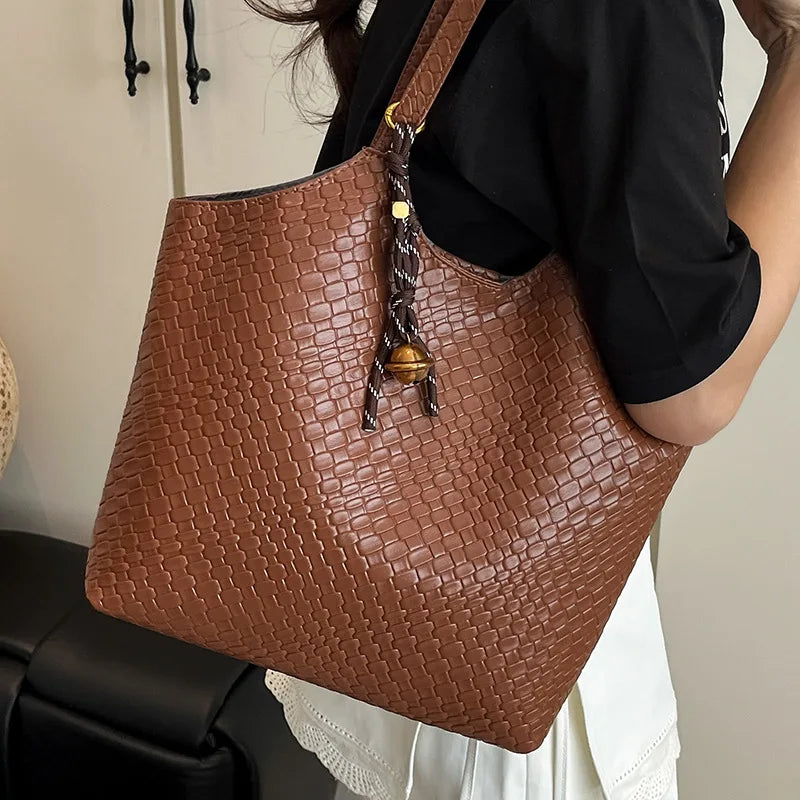 Woven Leather Tote Bag for Women – Soft Shoulder Handbag with Braided Pendant